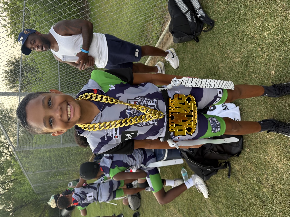 Frisco Elite athlete with the Got That Dawg In Me championship belt