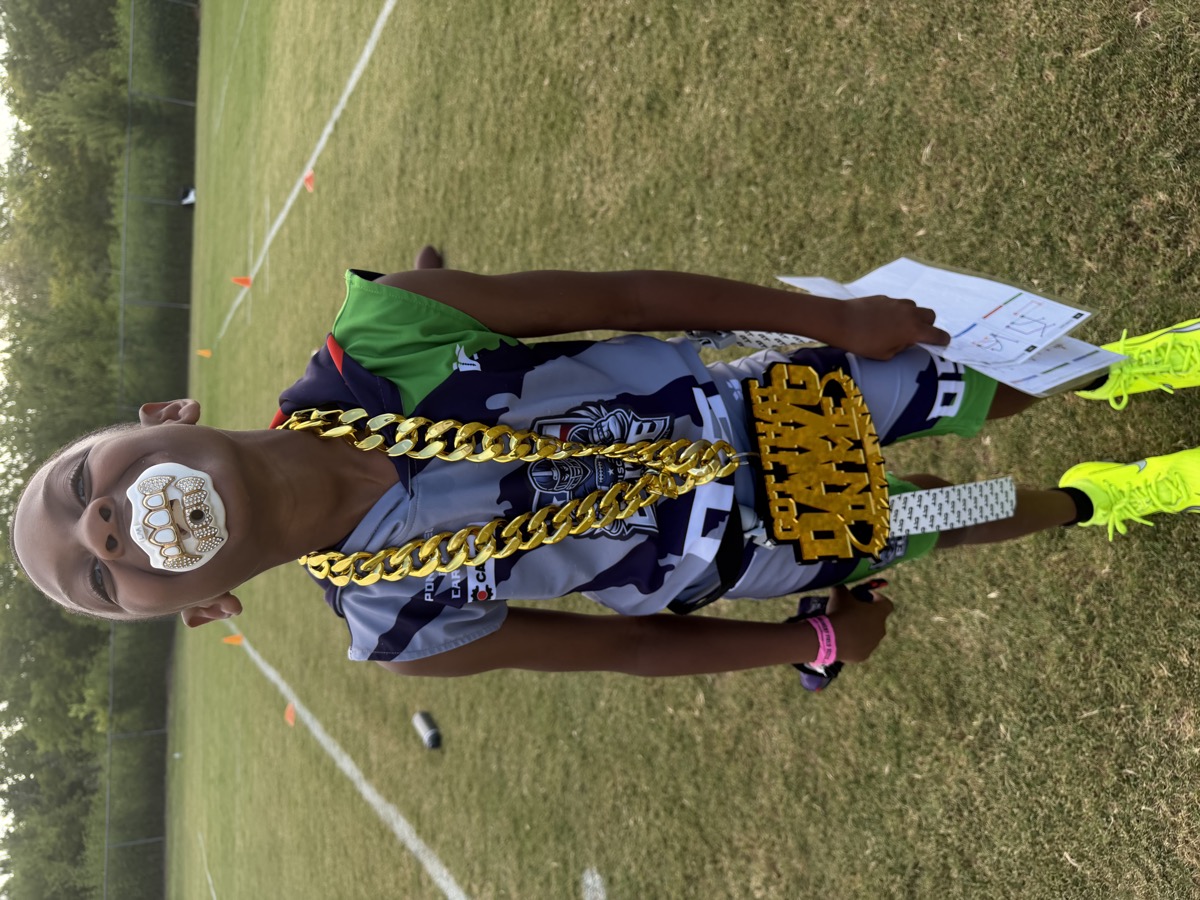 Frisco Elite athlete with the Got That Dawg In Me championship belt
