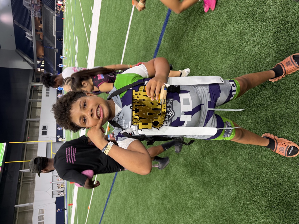 Frisco Elite athlete with the Got That Dawg In Me championship belt