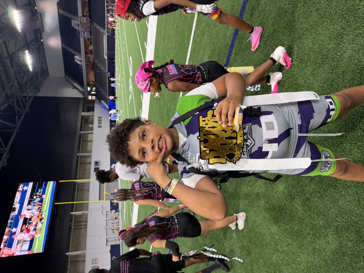 Frisco Elite athlete with the Got That Dawg In Me championship belt