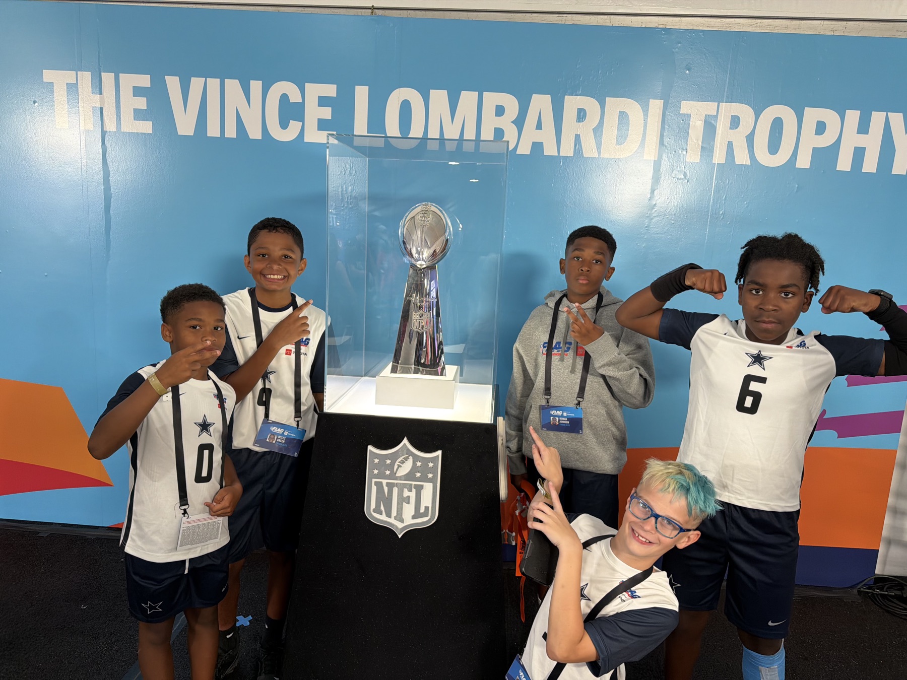 Frisco Elite team with the Vince Lombardi Trophy at the NFL FLAG Championships